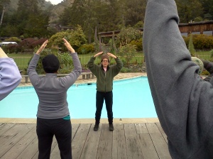 Denise Minter teaching Qigong by the poolside at the Esalen Institute